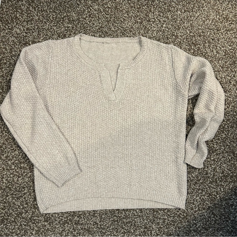 Women’s cream top with v neck